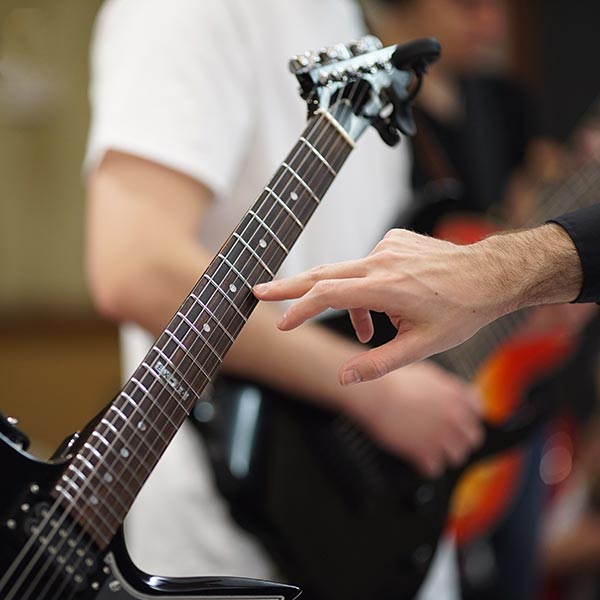 Guitar teacher coaching